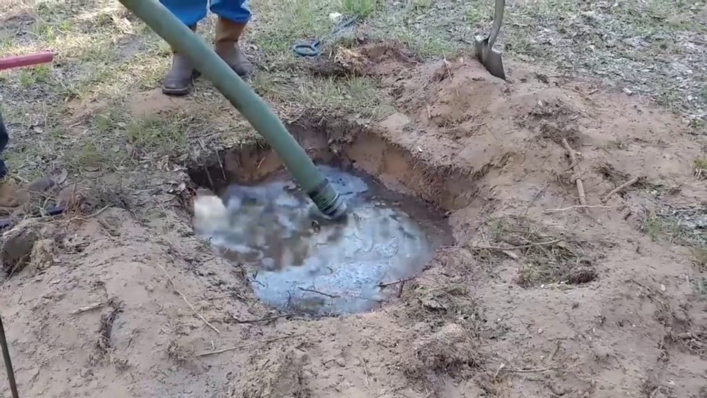 Septic tank draining - Greater Houston Septic Tank & Sewer Experts